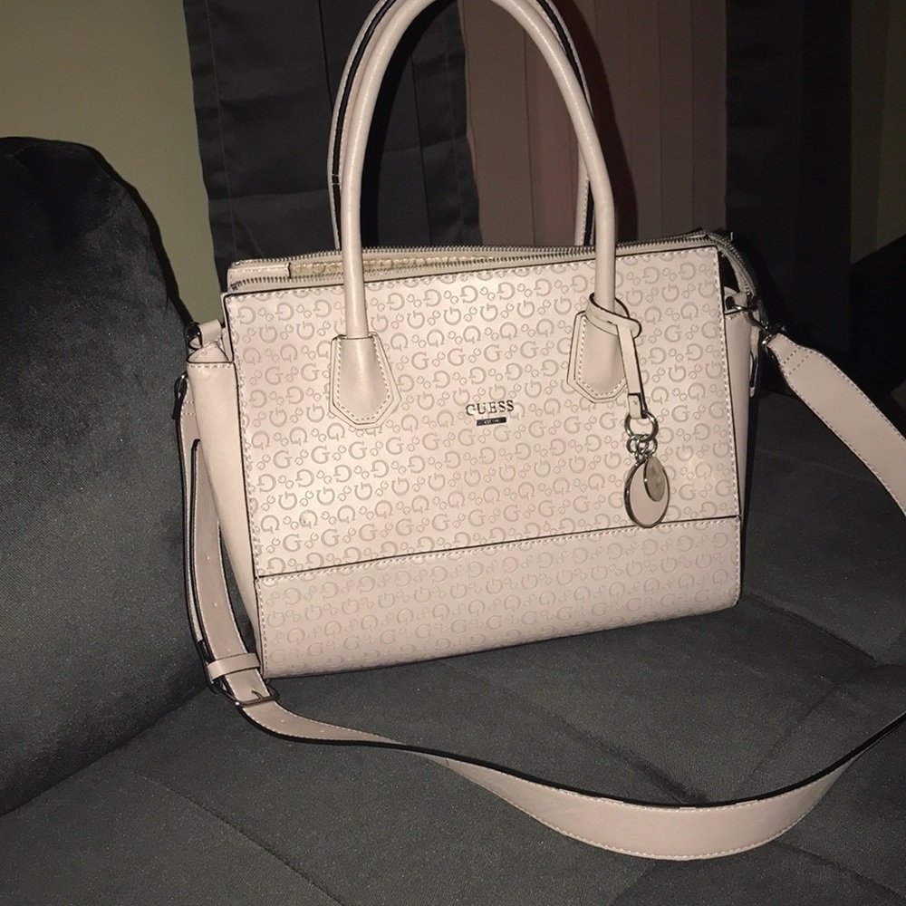 Guess purse with detachable strap.
